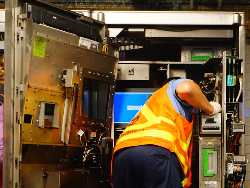 A technician servicing an air handling unit